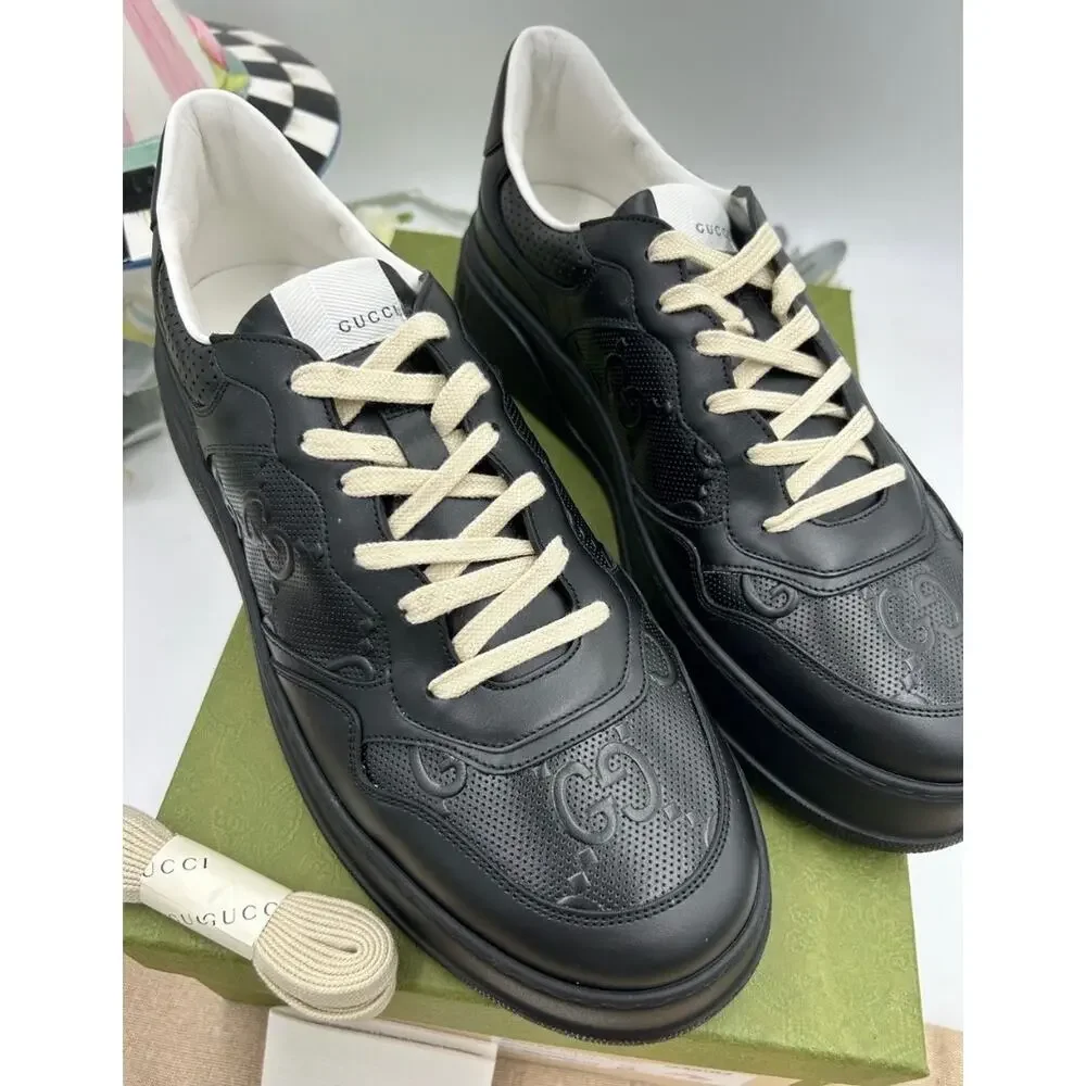 Men's Gucci, GG embossed leather sneakers size 13 fits 13.5 US made in Italy